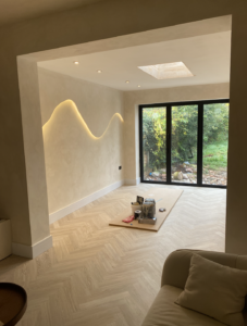 View of the dining area from the snug. All walls limewashed including snug ceiling.